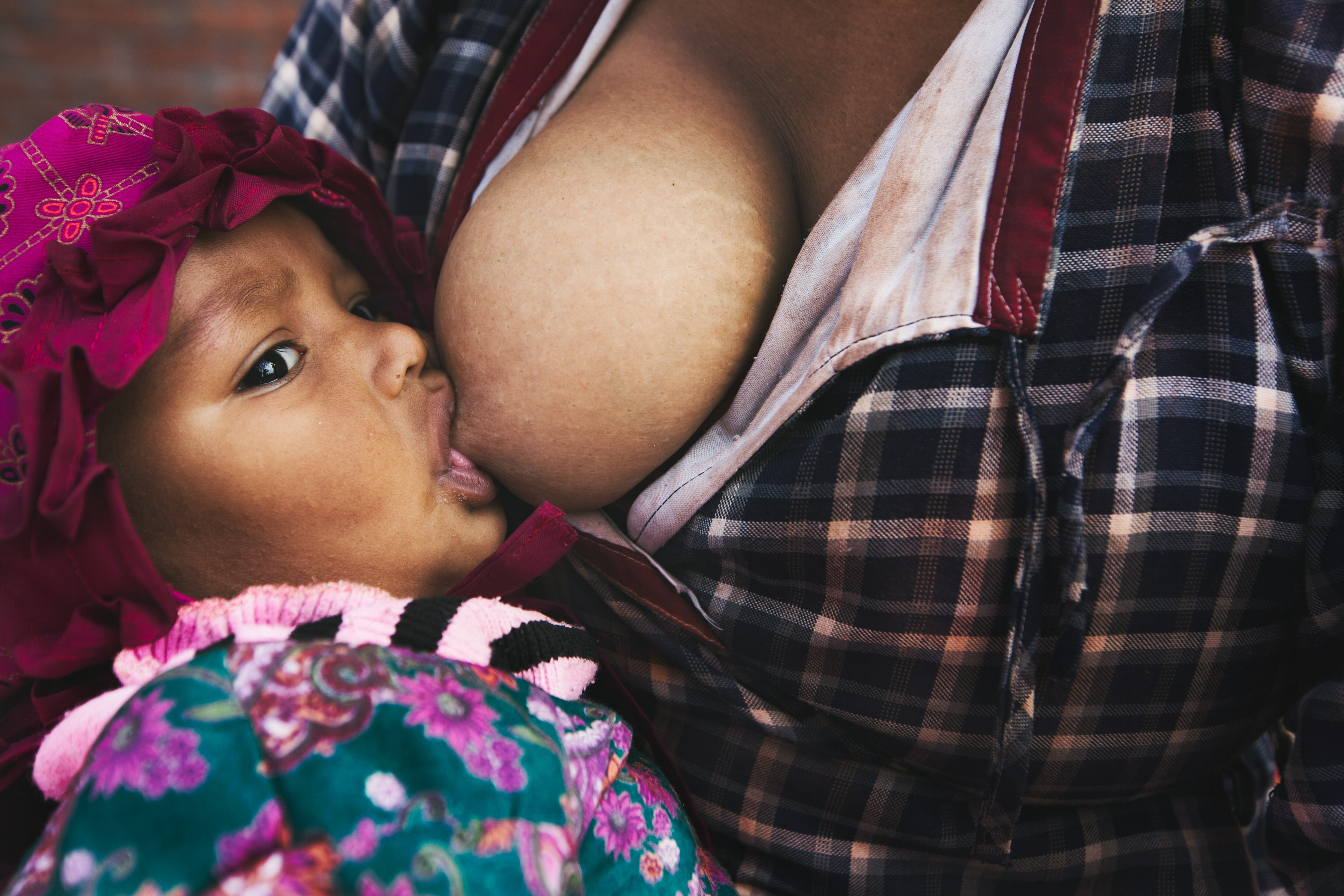 Human Milk - Tailor-made for Tiny Humans. Babywearing and breastfeeding are a perfect match.