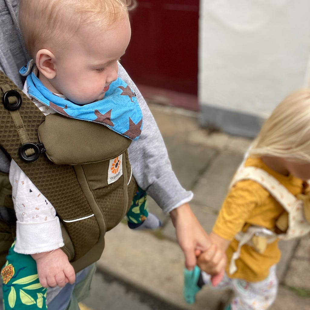 Baby in a ergobaby babycarrier in Father's Day