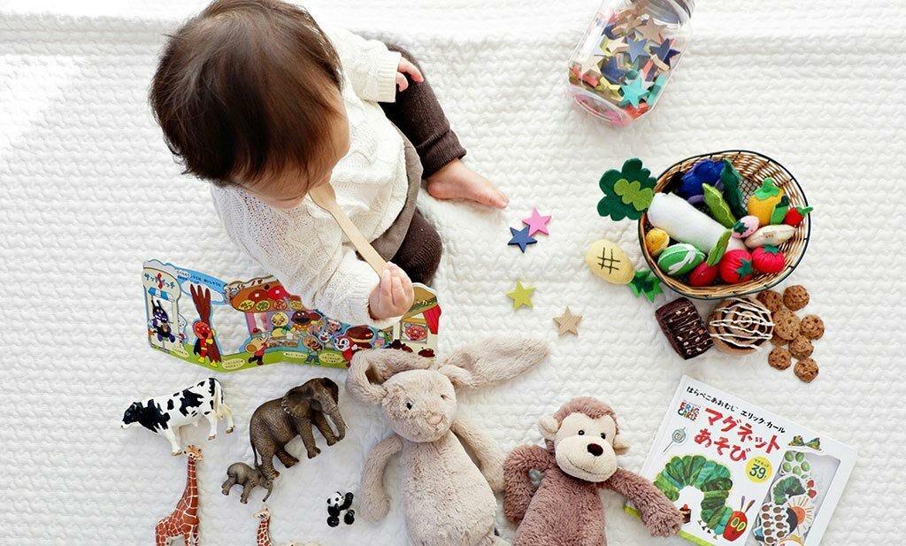 Baby with toys at home