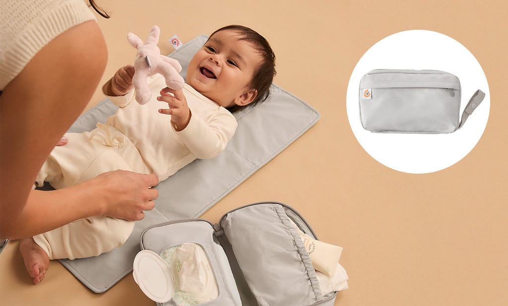 How to change a newborn nappy - Portable changing pad