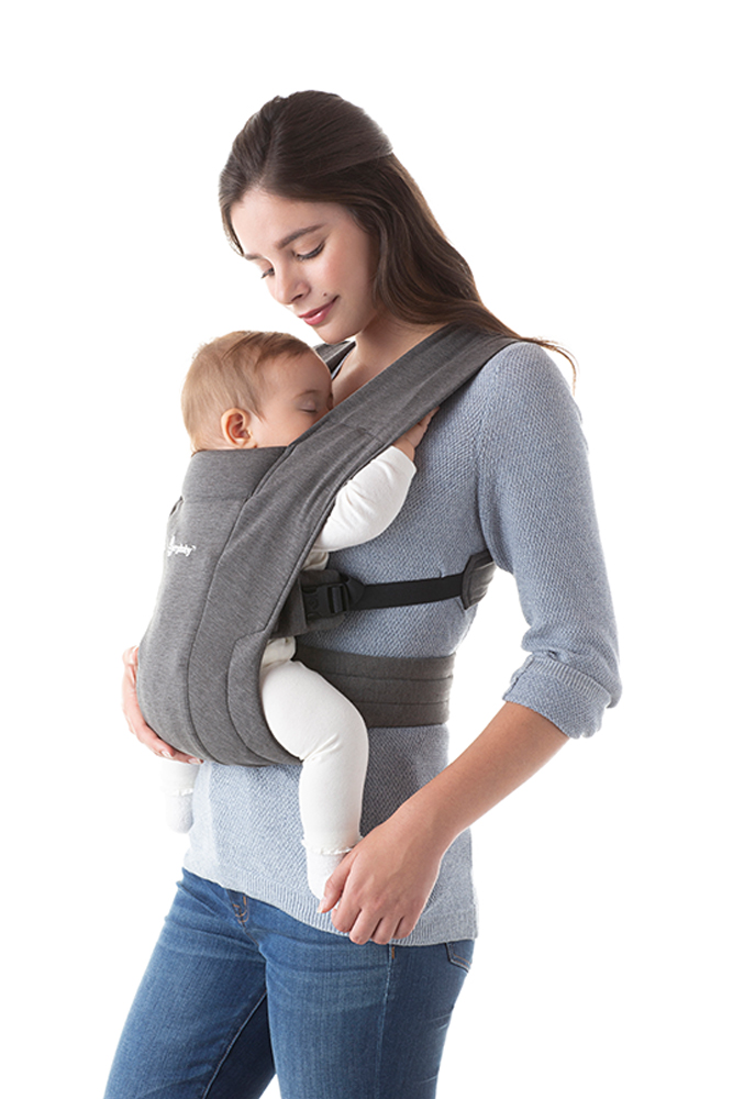 Mom using Embrace Baby Front Carry